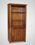 Wooden bookshelf with a door on a gray background
