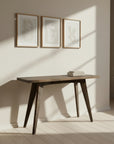 Wooden table with a dark finish on a light gray background
