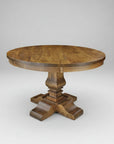 Round wooden table with a pedestal base on a white background