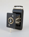Vintage Kodak Jiffy camera on a grey background