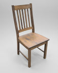 A rustic Mini Mission side chair with a wooden seat and backrest, constructed from solid wood.