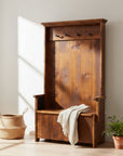 Wooden bench with backrest and coat hooks on a white background