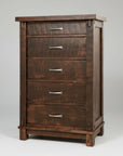 A brown wooden dresser with five drawers, featuring a millsawn texture and sturdy bolt accents.