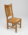 A handcrafted Canadian made solid wood chair with a vertical slat backrest and a flat wooden seat.
