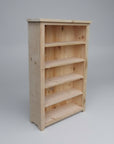 A wooden Dakota bookcase with multiple shelves, displayed against a white background.