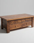 Wooden coffee table with a rustic finish on a gray background