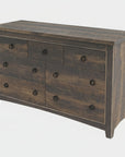 A brown wooden dresser with seven drawers, featuring a Millsawn wood texture finish and metal drawer pulls.
