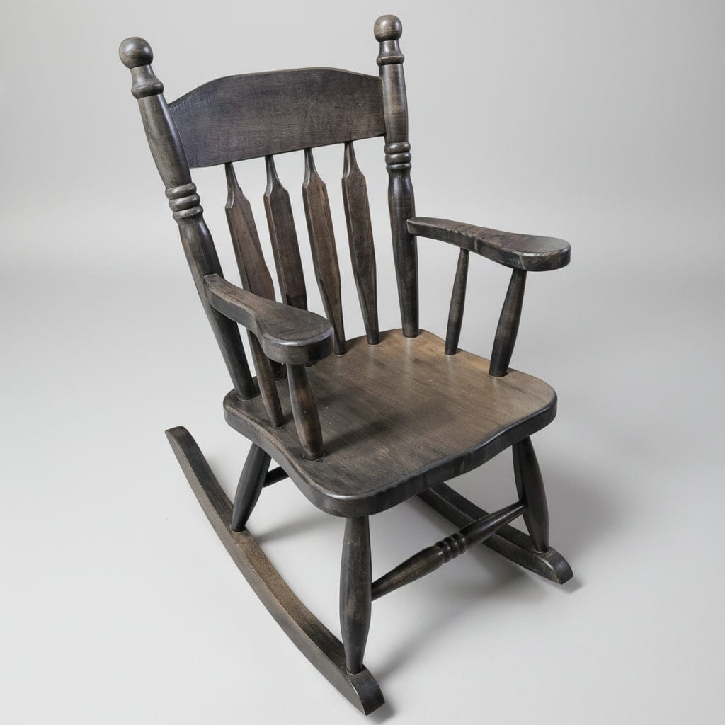 Wooden rocking chair in a white background