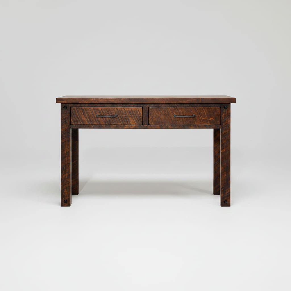 A rustic dark brown wooden writing desk with two drawers and dark metal handles, shown against a plain white background.