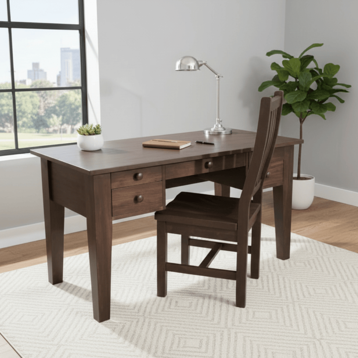 Wooden desk with chair in a room with large windows and plants