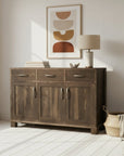 Wooden sideboard with three doors and two drawers on a white background