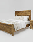 A rustic, Canadian-made wooden bed frame with a headboard and footboard, displayed in a room setting with bedding and a nightstand.