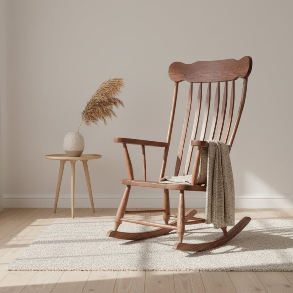 Wooden rocking chair on a gray background