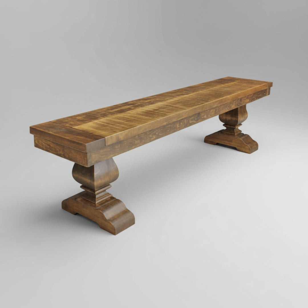 A wooden pedestal bench with a decorative base and a standard wood texture finish.
