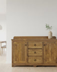 Wooden sideboard with drawers and doors on a white background