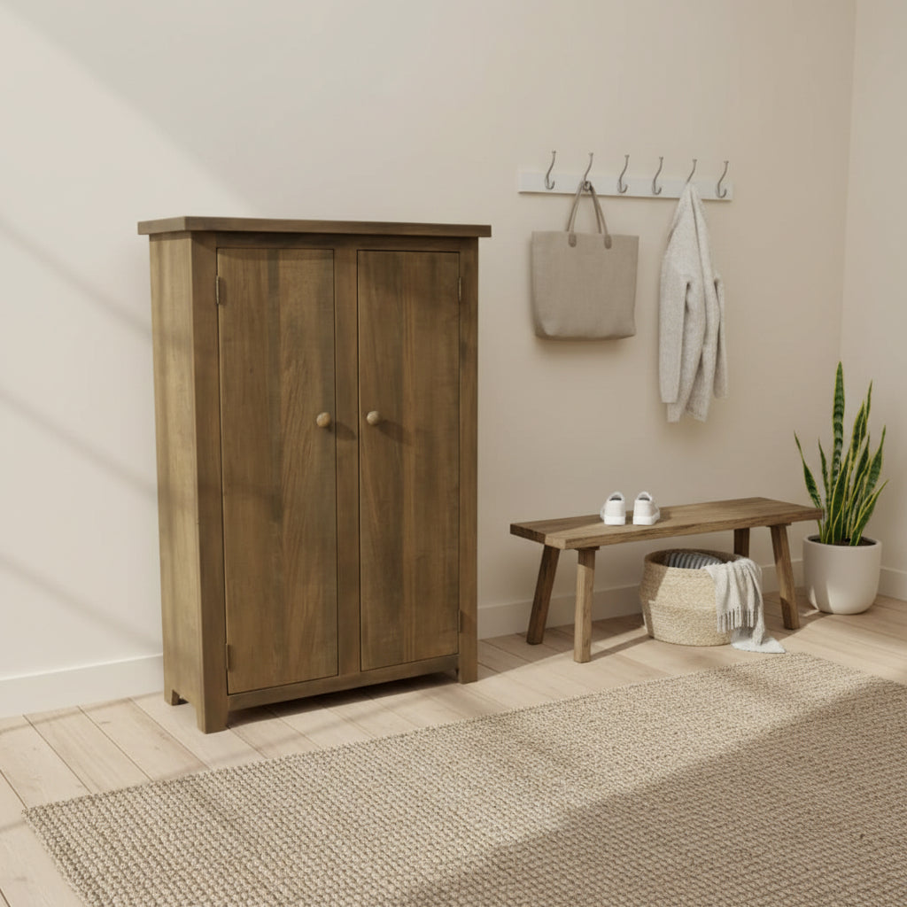 Wooden cabinet with two doors on a white background