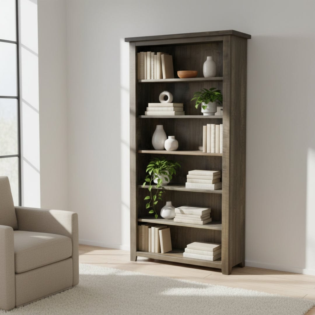 Wooden bookshelf with five shelves on a white background