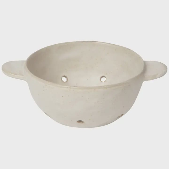 Ivory ceramic berry bowl with handles on a white background