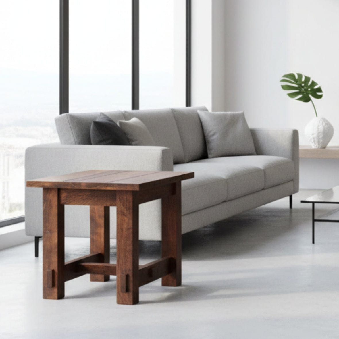 Wooden side table with a dark brown finish on a white background