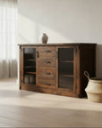 Wooden sideboard with glass doors on a white background