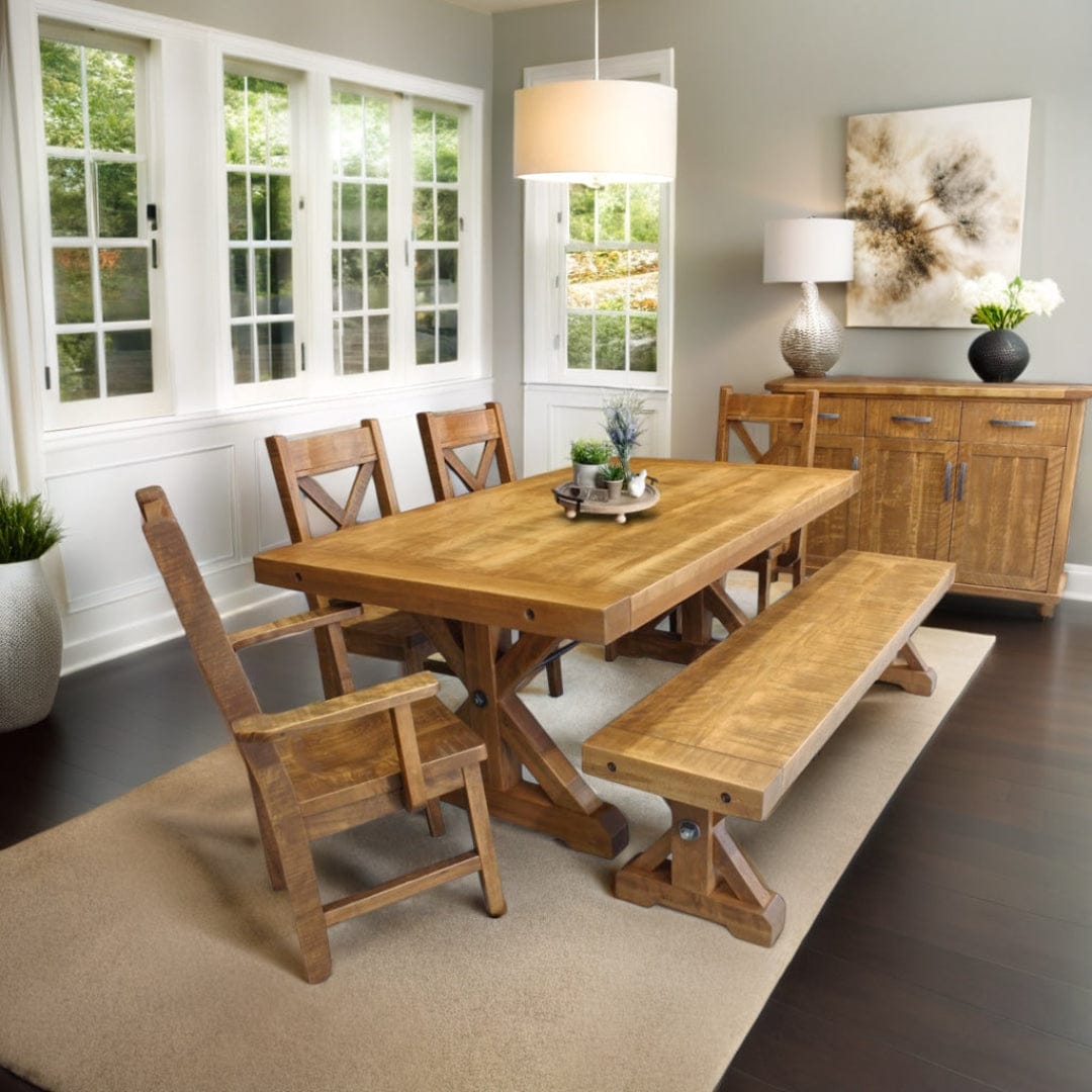Dining room with wooden table and chairs in a well-lit room.