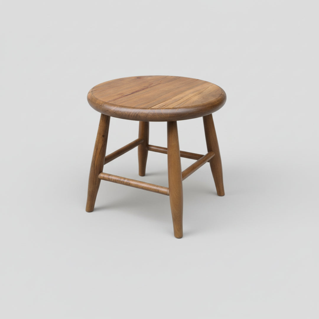 Wooden stool with a round seat on a white background