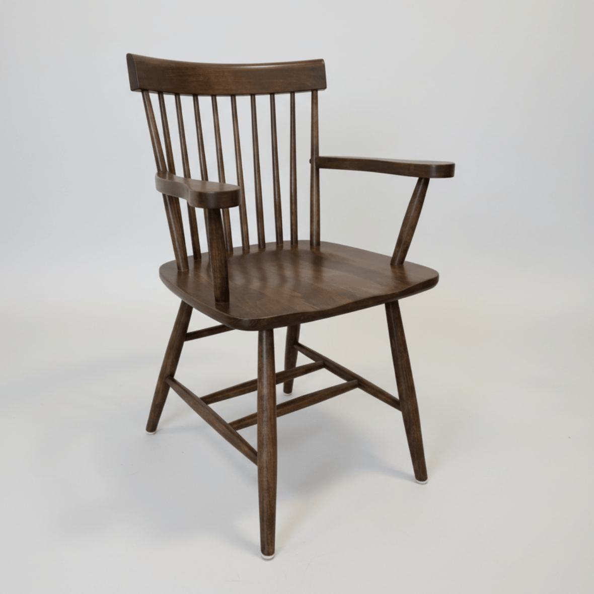 Wooden chair with armrests on a white background