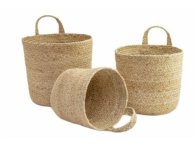Three woven baskets of different sizes on a white background