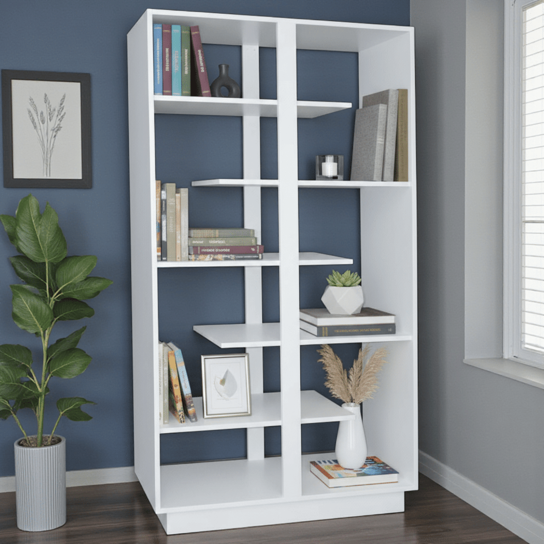 White bookshelf with decorative items against a blue wall
