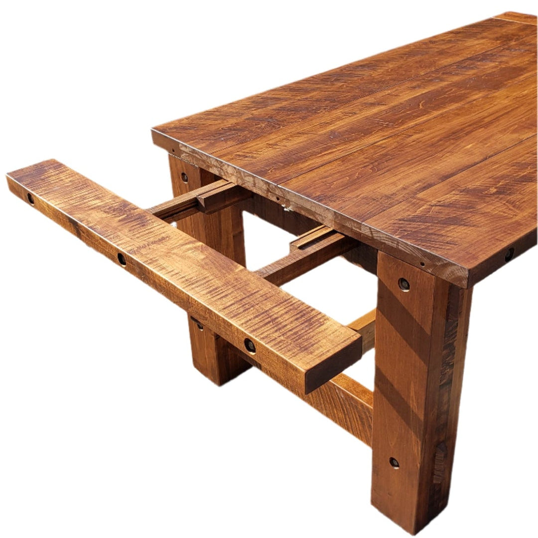 Wooden table with attached bench on a white background