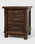 A Canadian made rustic Timber nightstand with three drawers, featuring millsawn wood texture and bolt accents, in a dark brown color.