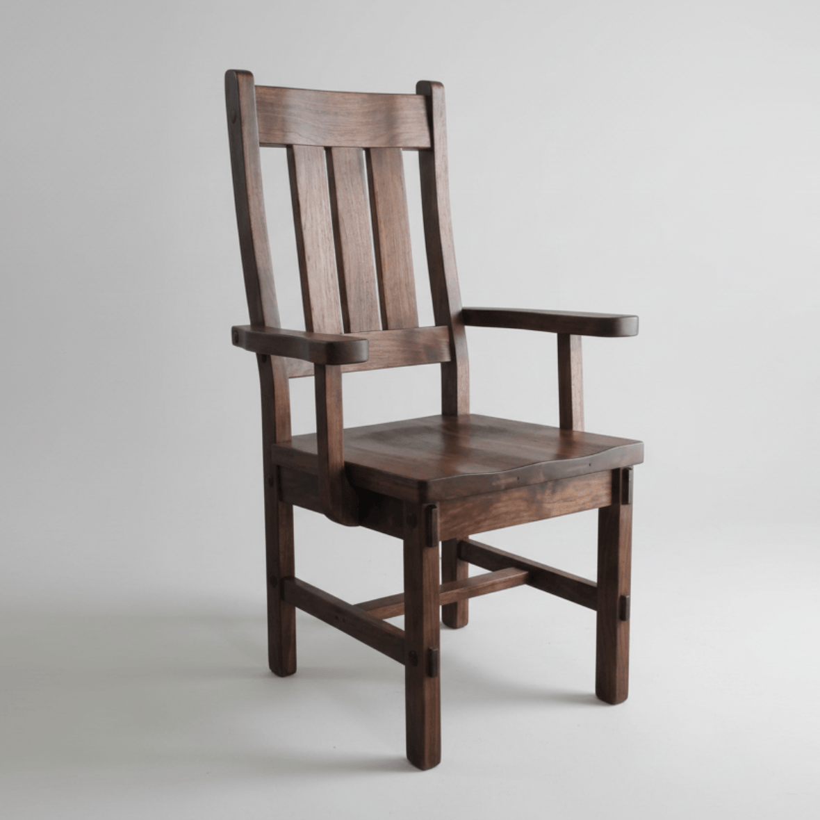 Wooden chair with armrests on a white background