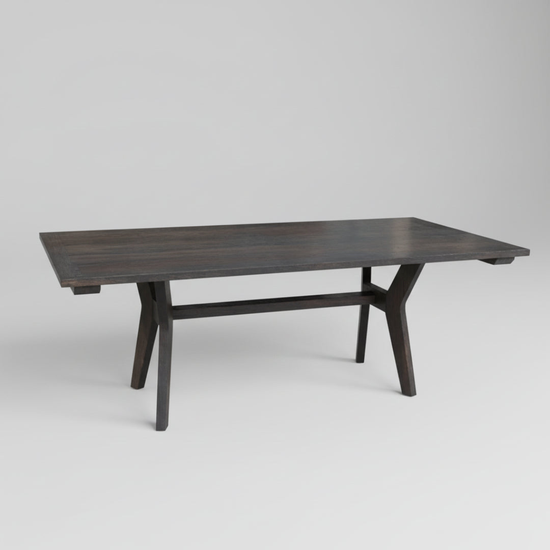 A sleek, mid century modern avenue dining table made of solid wood with a dark windswept texture, handcrafted in Canada.