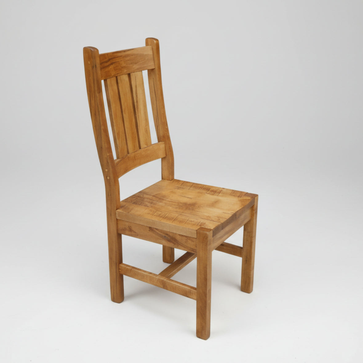 A handcrafted Canadian made solid wood chair with a vertical slat backrest and a flat wooden seat.