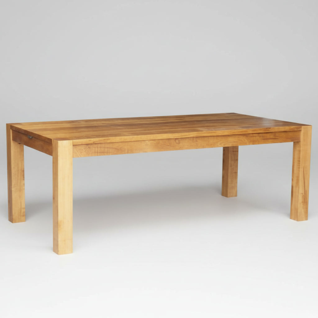 A rectangular Canadian-made solid wood harvest table with square legs.