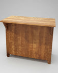 A rustic solid wood Dakota Bar with an open back design, featuring a natural wood finish.