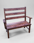 A rustic style Dakota ladder back hall bench made of solid wood with a visible wood grain texture and saw marks.