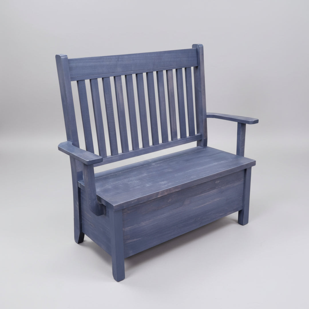 A rustic blue Dakota slat back storage bench made of solid wood, with a bench seat and backrest.