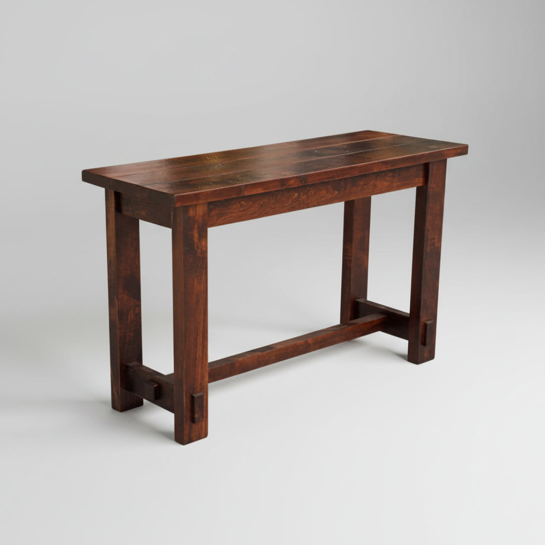 A rustic chunky plank style sofa table made of Canadian solid wood, with a visible textured surface and a dark brown stain finish.