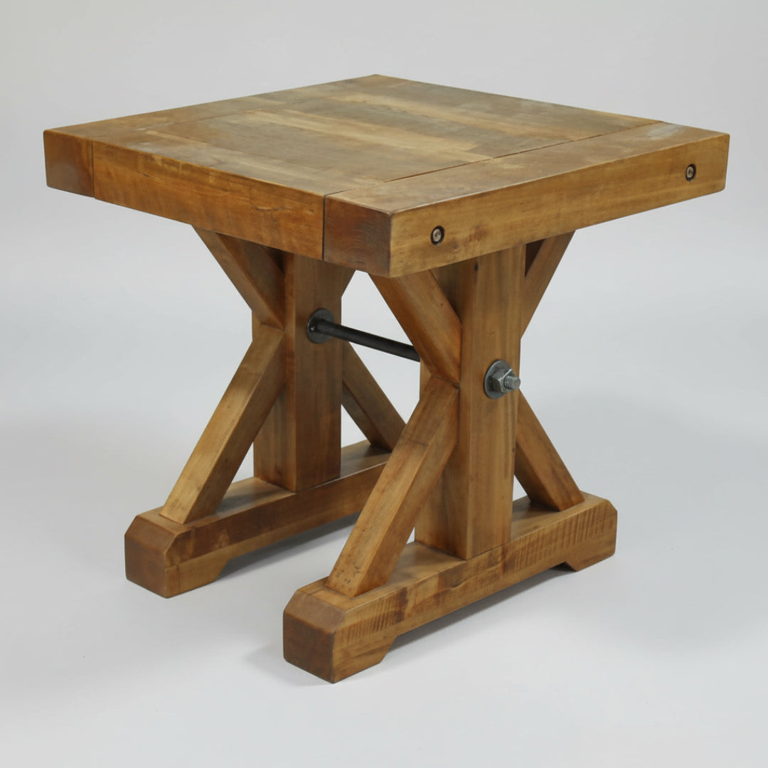 A rustic Klondike end table made of solid wood with metal rod support, viewed from a slightly elevated angle.