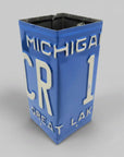 A square metal container or planter styled like a vintage Michigan CR 1 Great Lakes license plate, featuring a blue background with raised white lettering, shown on a plain light gray background.