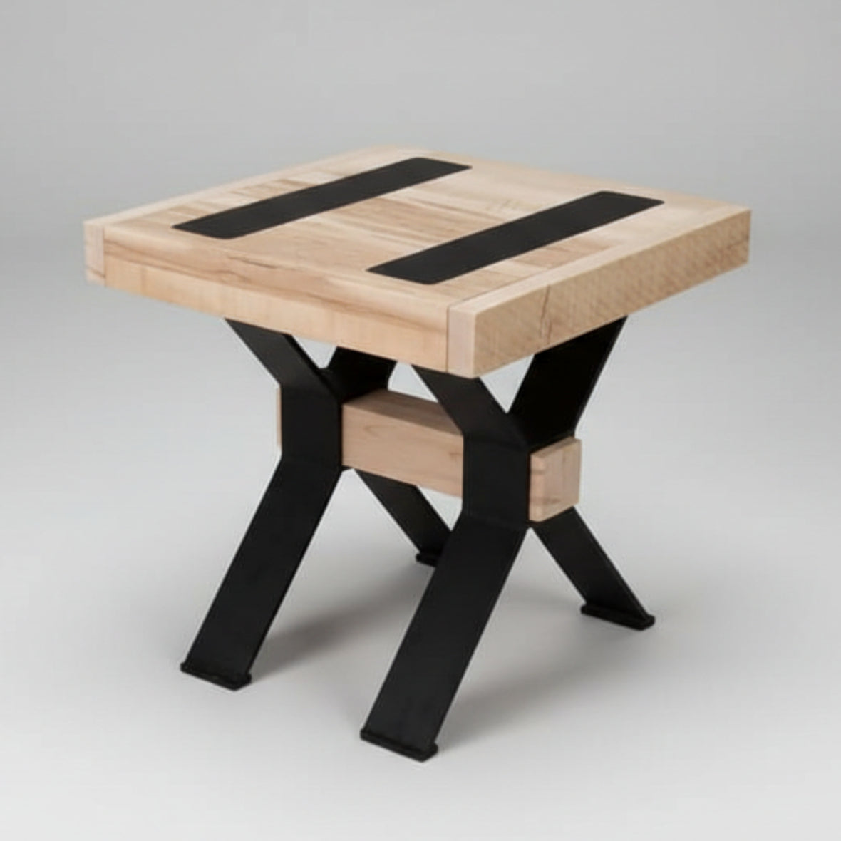 A square-shaped Millwright end table with black metal legs and a wood top, featuring a unique table top insert.