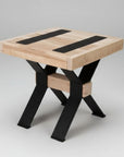 A square-shaped Millwright end table with black metal legs and a wood top, featuring a unique table top insert.