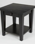 A black Nith River end table with one drawer and a lower shelf, featuring a square top and tapered legs.