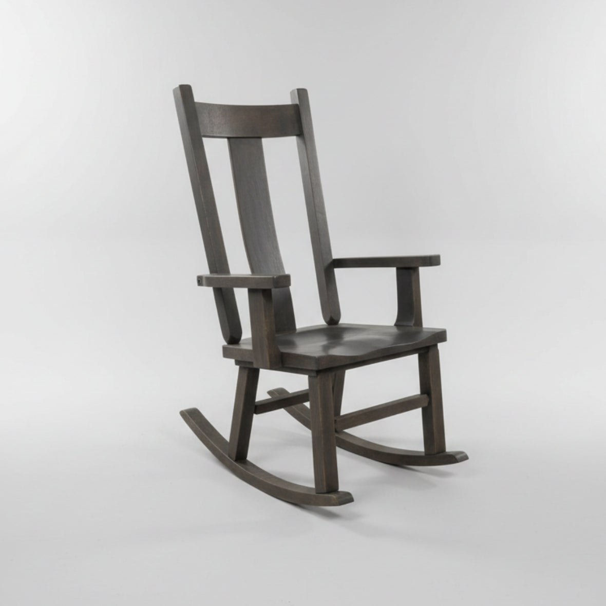 A rustic wide slat rocker made of solid wood, with a smooth wood texture finish, displayed against a white background.